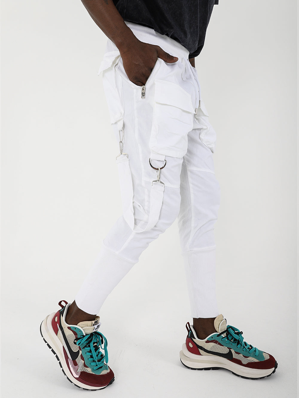 A man wearing BROOKLYN JOGGERS with adjustable drawstring waist and sneakers.
