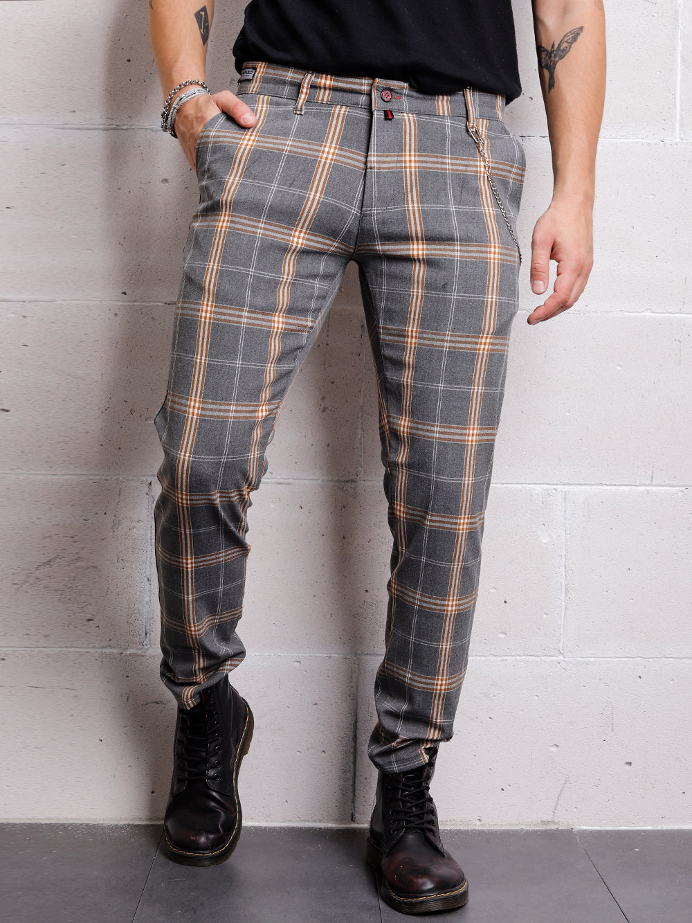A man wearing slim fit CHECKERED STONE jogging pants.