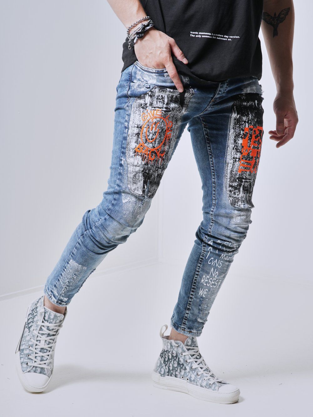 Side shot of a man wearing the skinny fit WANDERLUST Streetwear Jeans by SERNES
