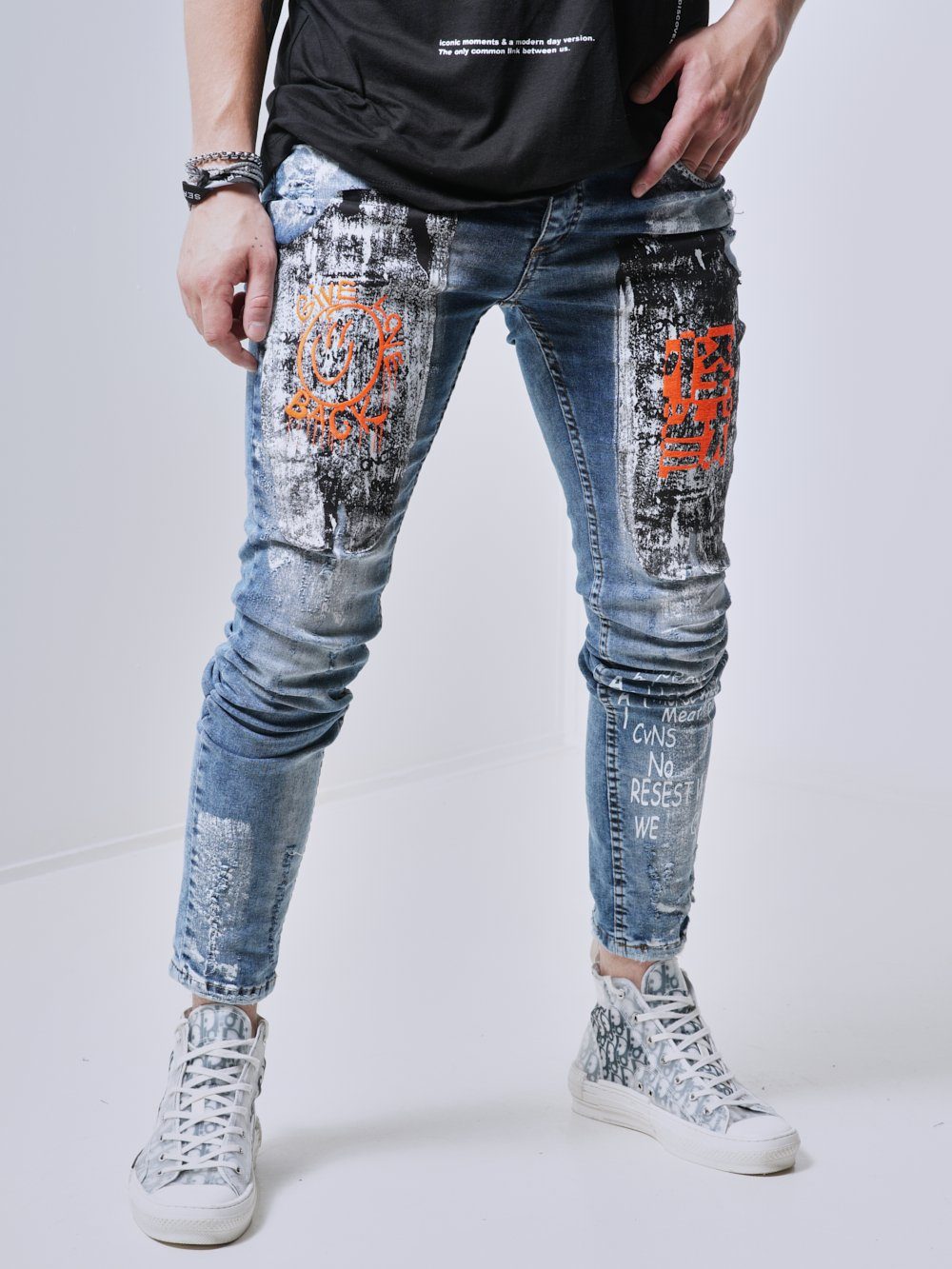 Man wearing the skinny fit WANDERLUST Streetwear Jeans by SERNES