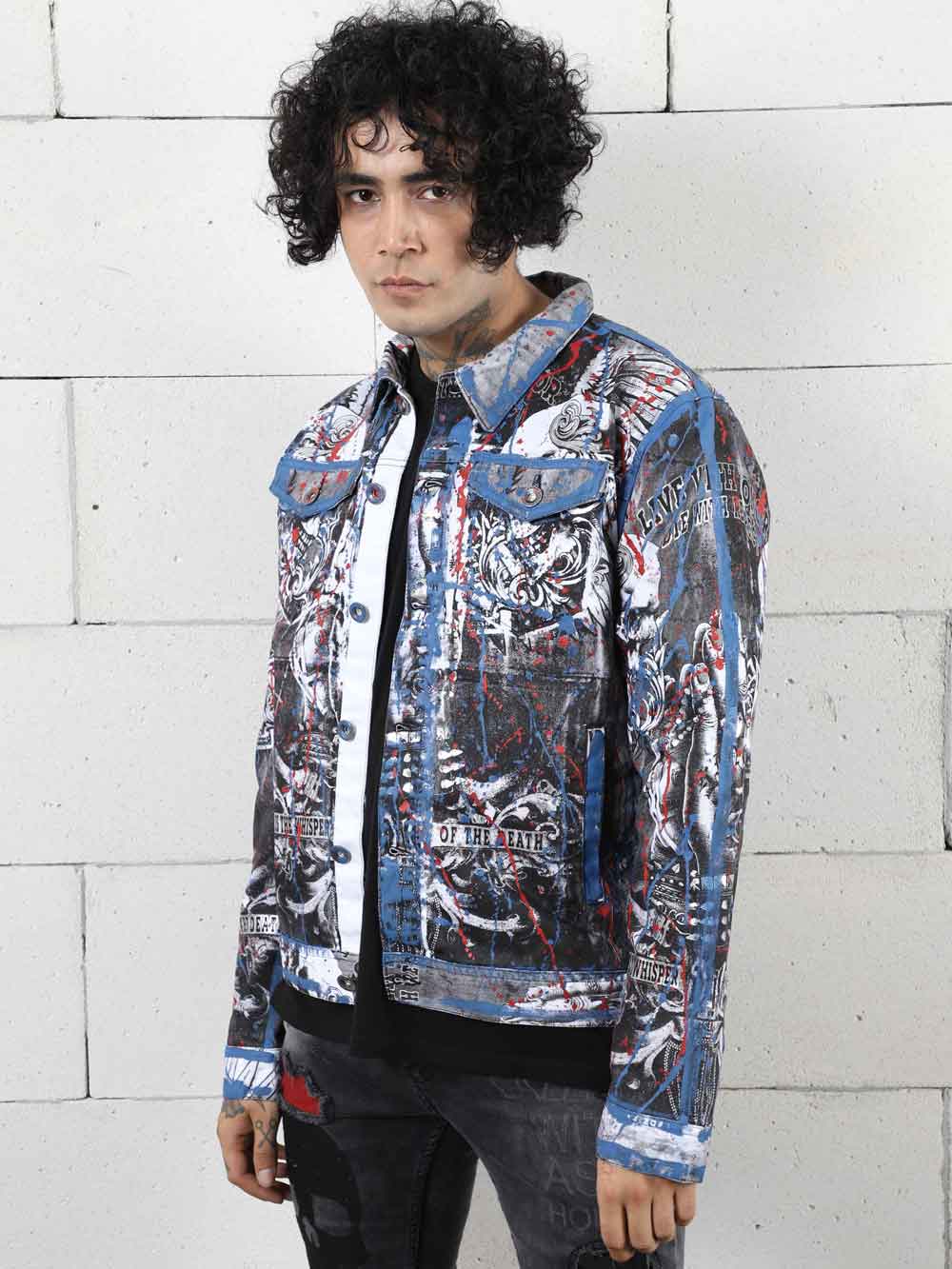A man donning a LA VIDA LOCA denim jacket, showcasing his trendy streetwear style.
