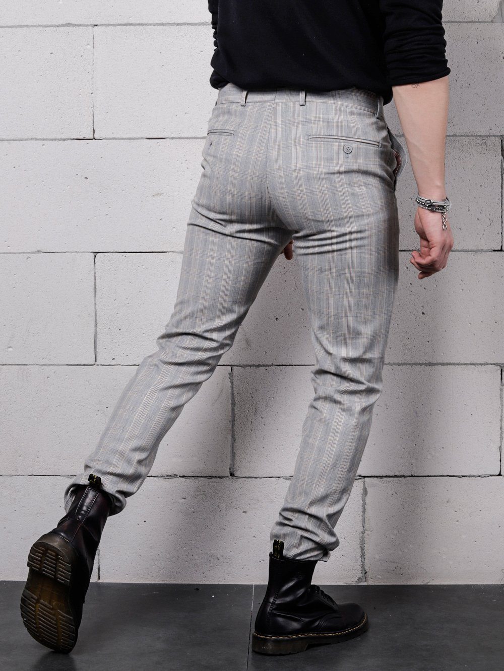 Lower body back shot of a man wearing VANILLA LATTE Striped Pants by SERNES