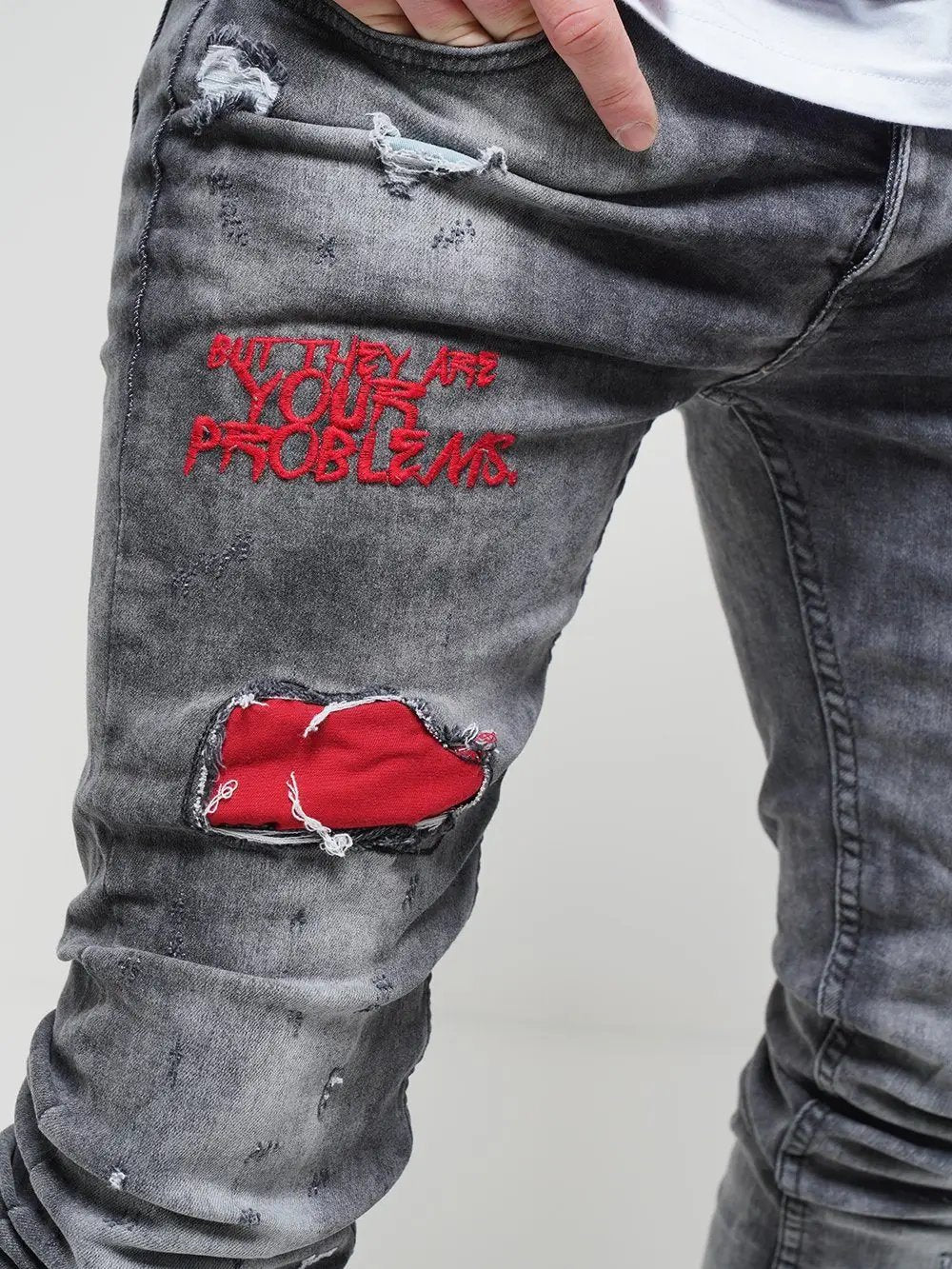 Close up thigh shot of  skinny streetwear jeans called THE OUTLAW Jeans by SERNES