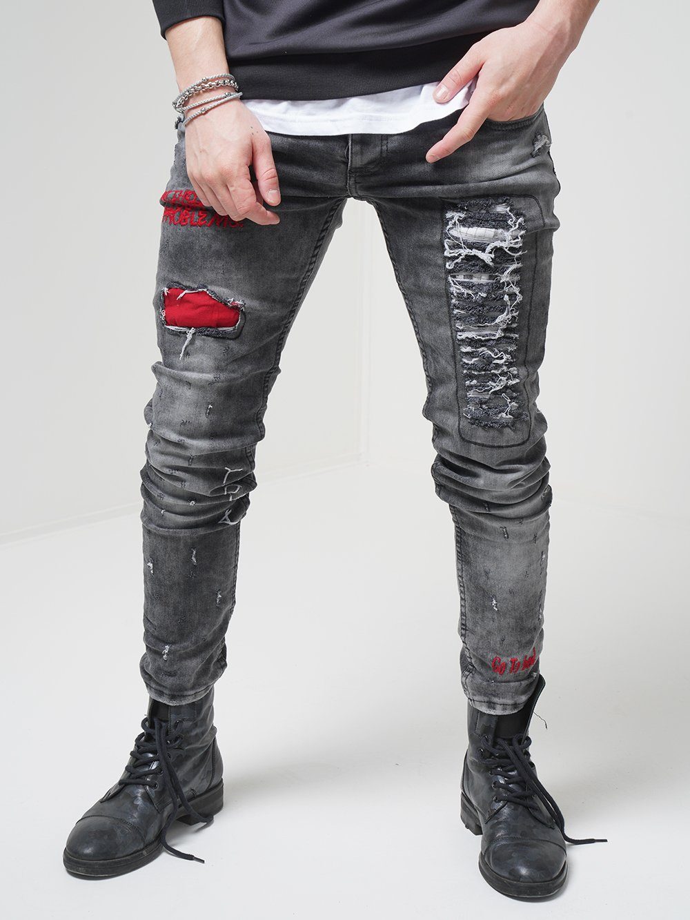 Front shot of a Man wearing skinny streetwear jeans called THE OUTLAW Jeans by SERNES